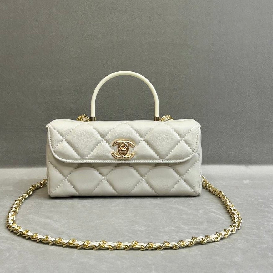 Chanel mini flap with top handle beige
