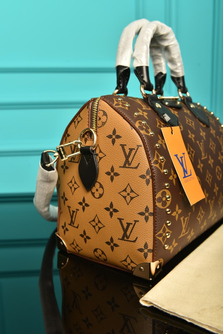 LV Speedy trunk 25 monogram reverse