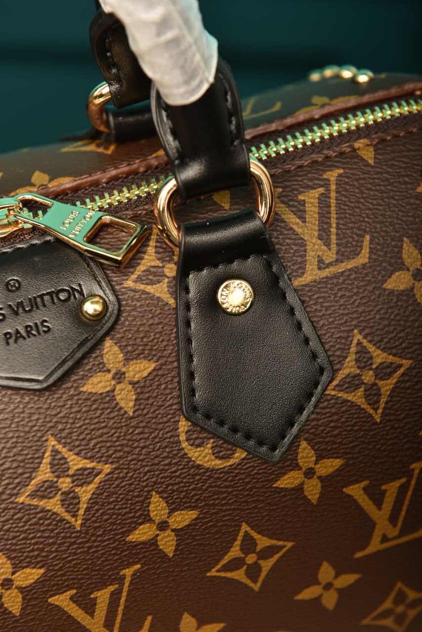 LV Speedy trunk 25 monogram reverse