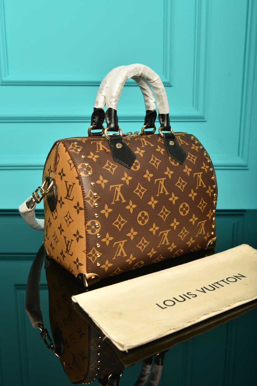 LV Speedy trunk 25 monogram reverse