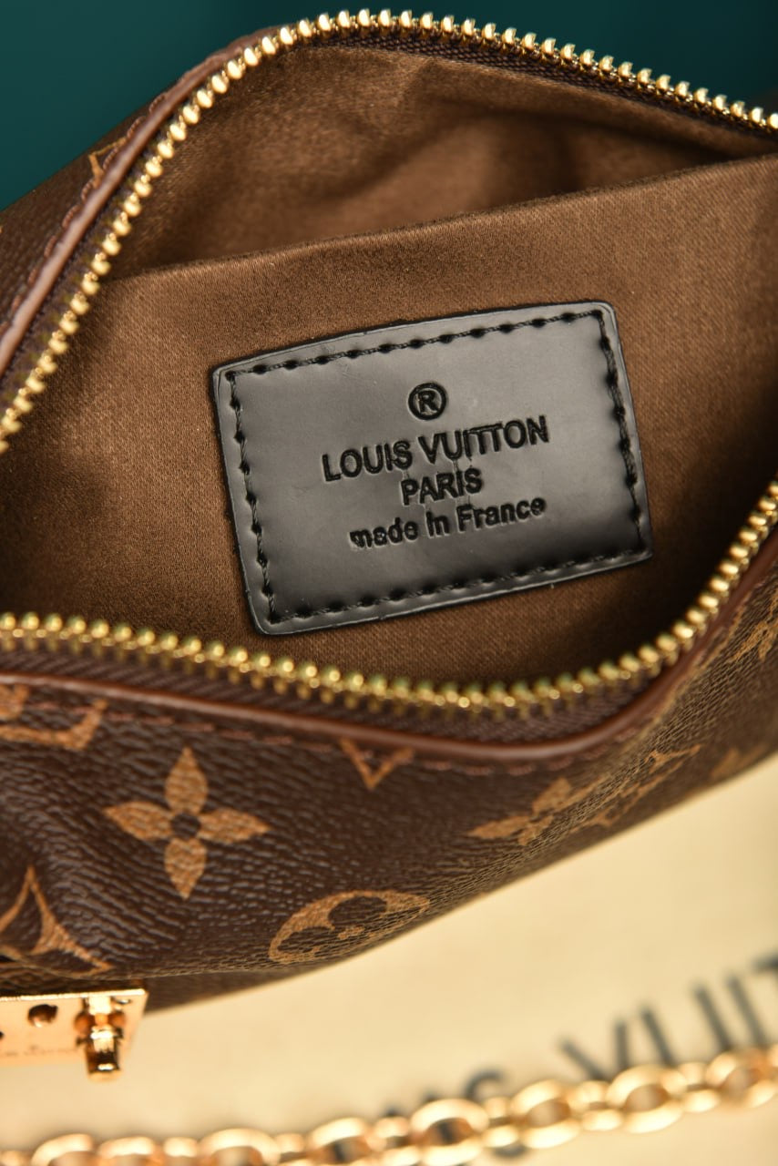 LV X TM SLIM TRUNK MONOGRAM (24cm x 11.5cm)