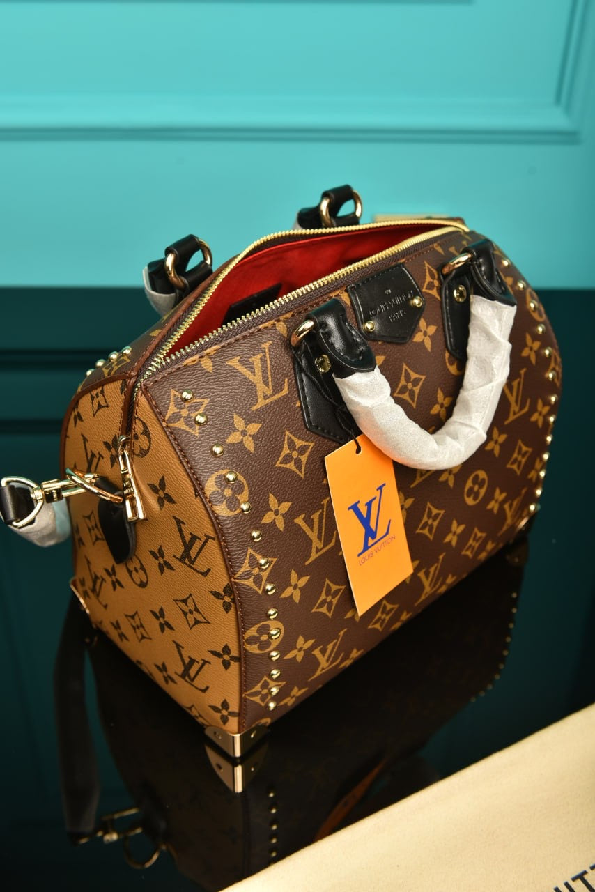 LV Speedy trunk 25 monogram reverse