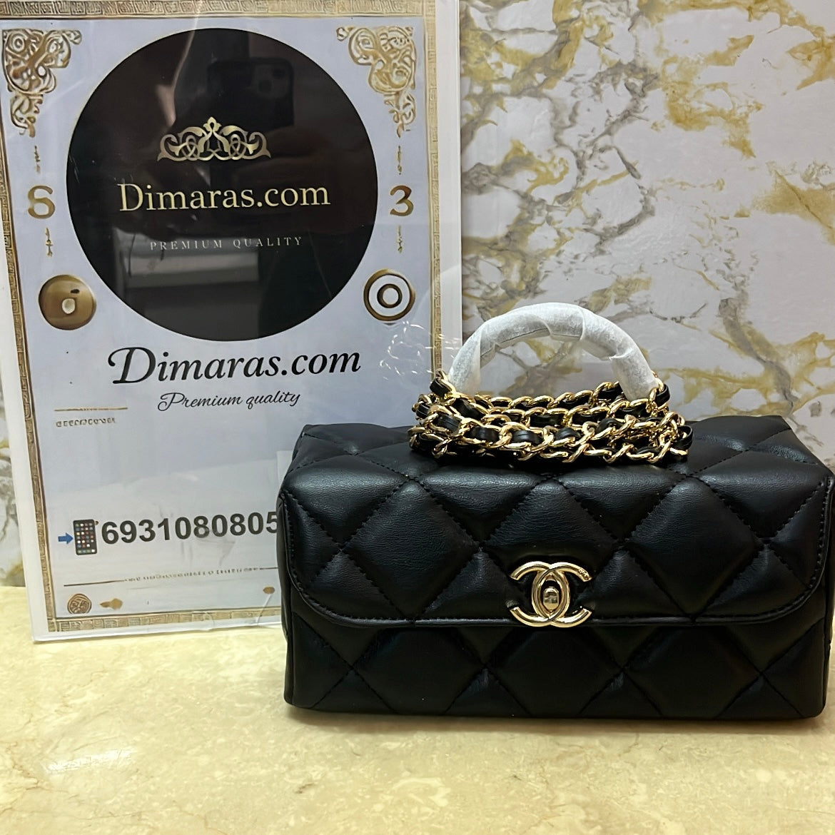 Chanel mini flap with top handle black