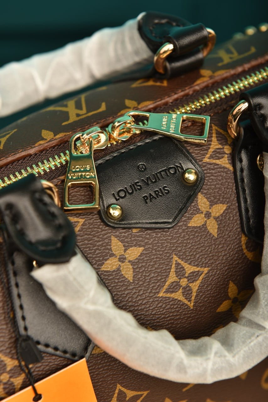 LV Speedy trunk 25 monogram reverse