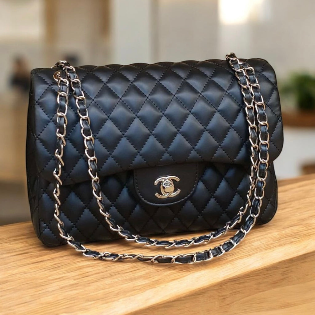 Chanel classic  flap black (size27cm x 18 cm)