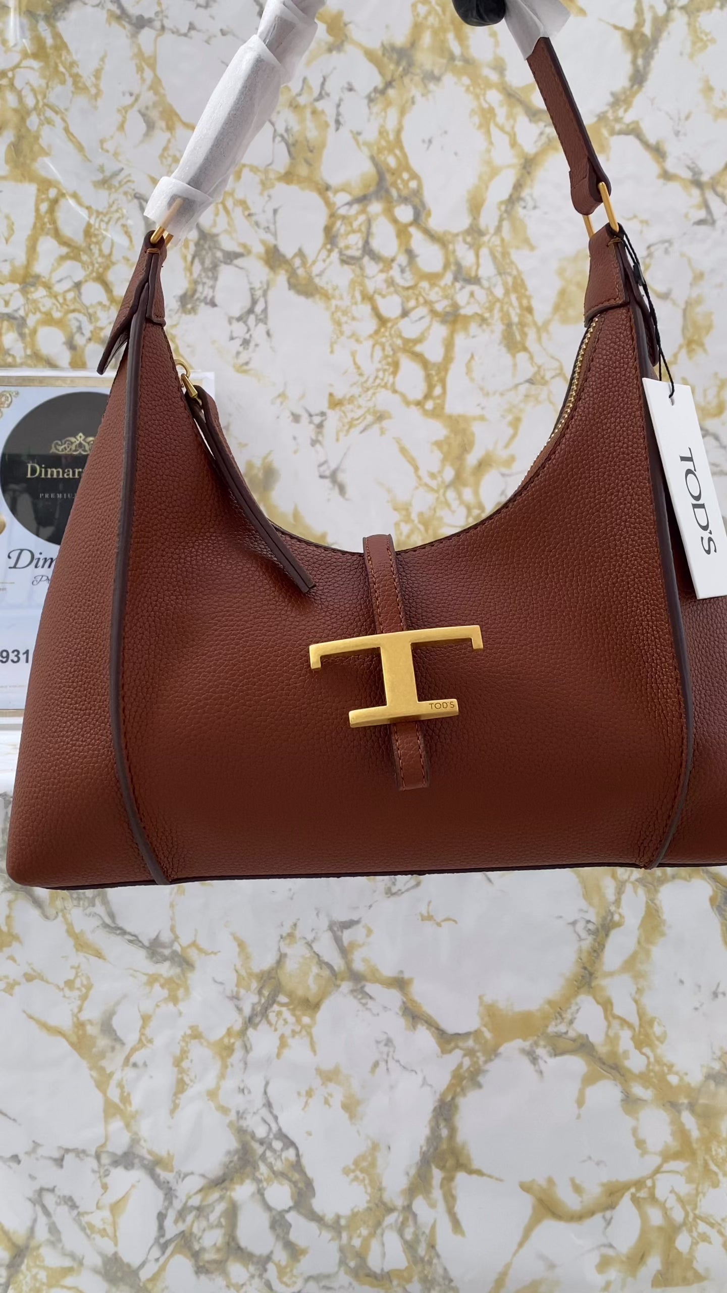 Tod’s shoulder taba (31cm x 26cm)