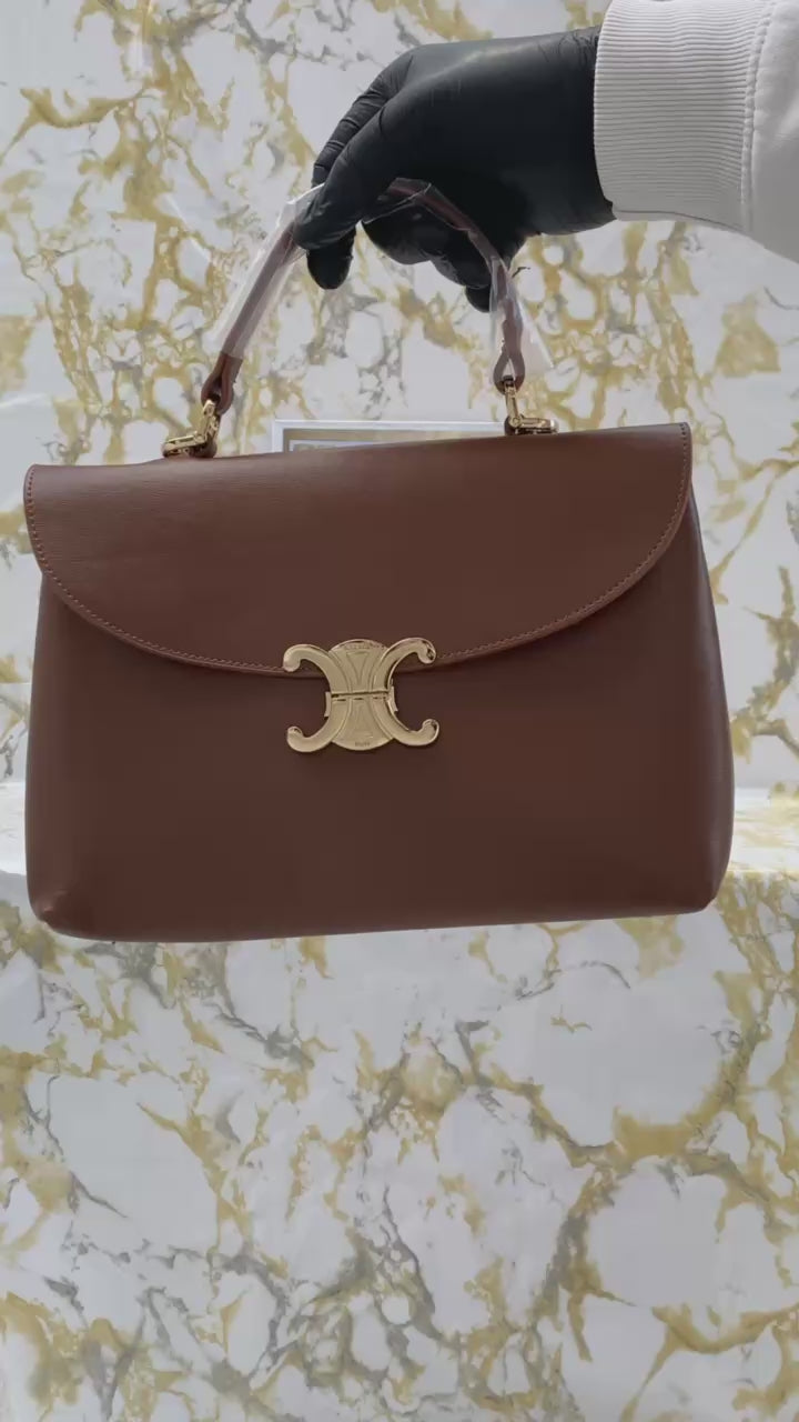 Celine medium nino bag in supple grained calfskin taba (25cm x 17.5cm)