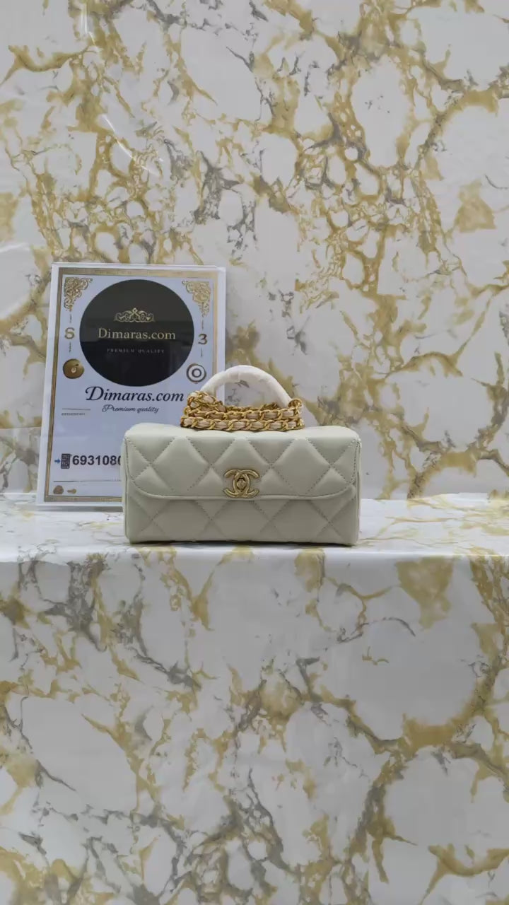 Chanel mini flap with top handle beige